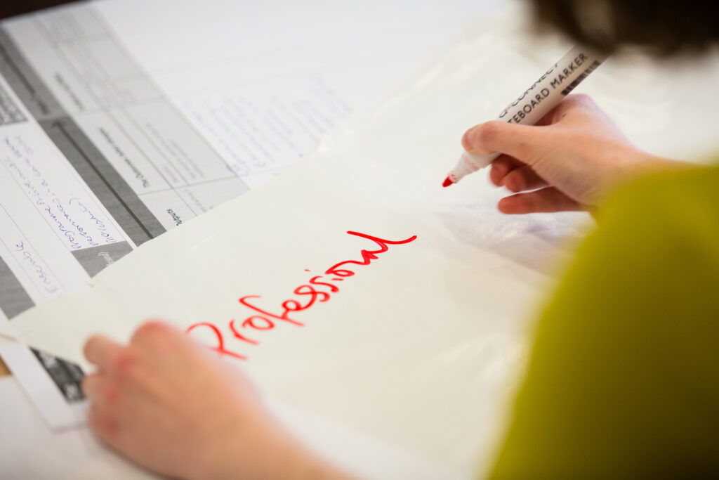 The word "Professional" written in on a post-it note